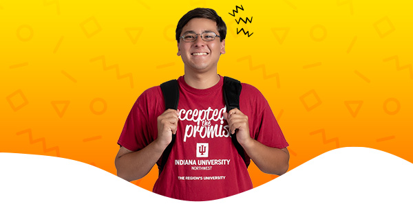 A student smiling in front of a colorful gradient with an illustrative burst on the right side of their head