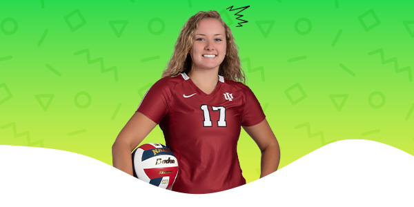 A student in her volleyball uniform t in front of a colorful gradient with an illustrative burst on the right side of her head