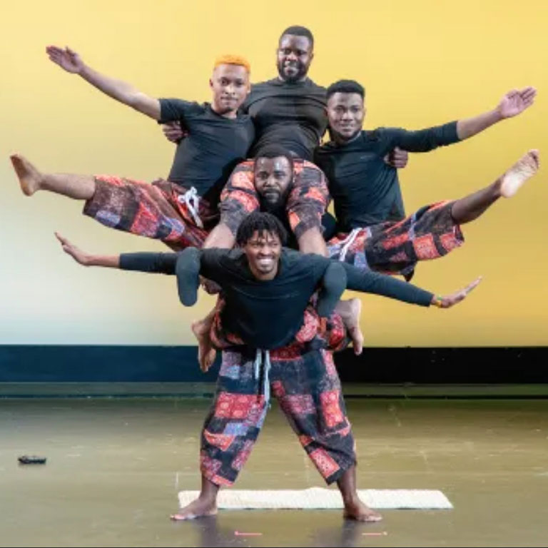 Members of The Zuzu African Acrobats from Tanzania form a human pyramid at Indiana University Northwest in Gary on Thursday, Feb. 1, 2024.